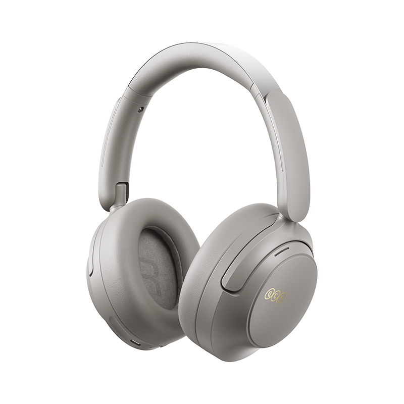 Auriculares inalámbricos grises QCY H3S, vista frontal, logotipo gris "R" en la orejera derecha.