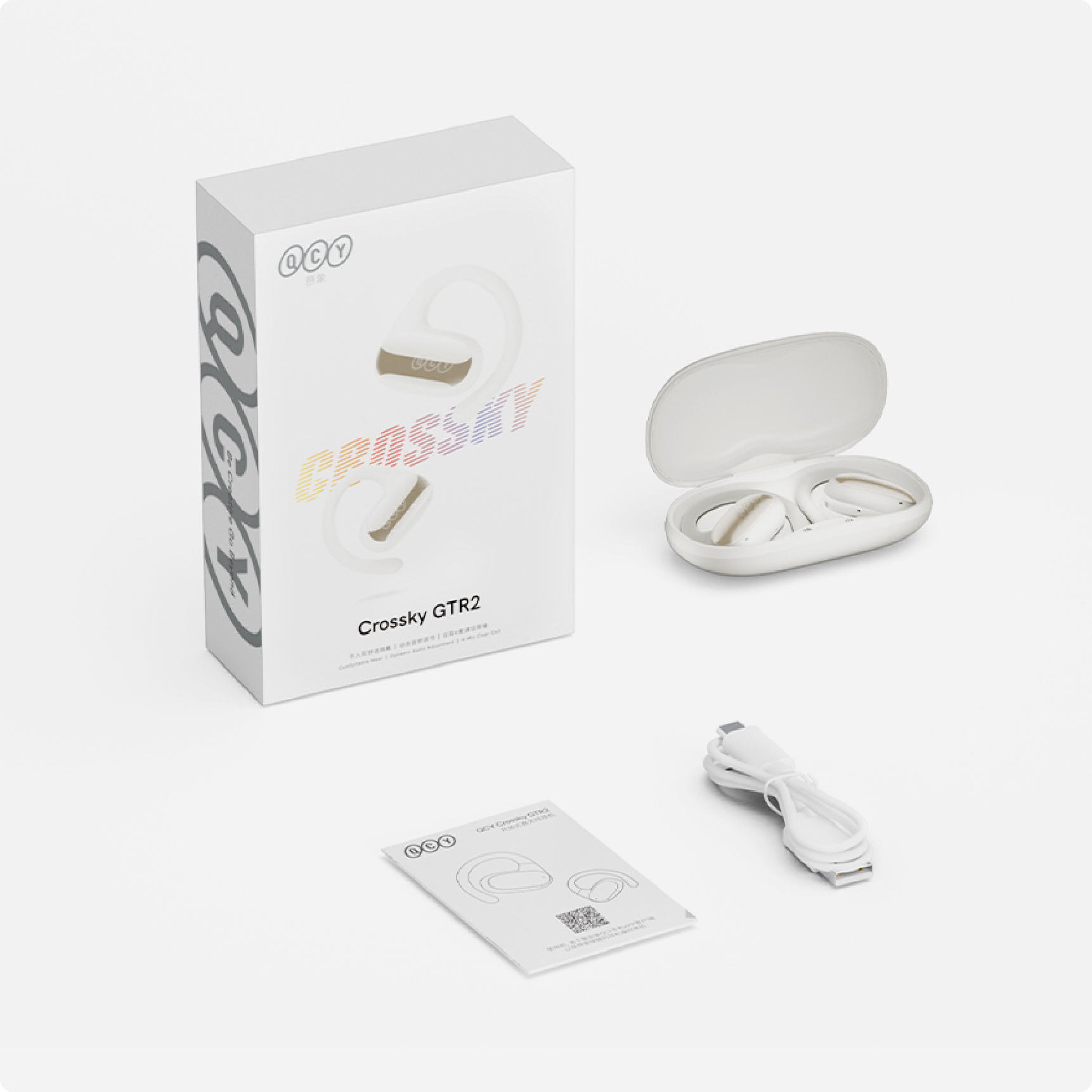 Auriculares Bluetooth QCY Crossky GTR2 blancos con estuche de carga, cable USB y manual.