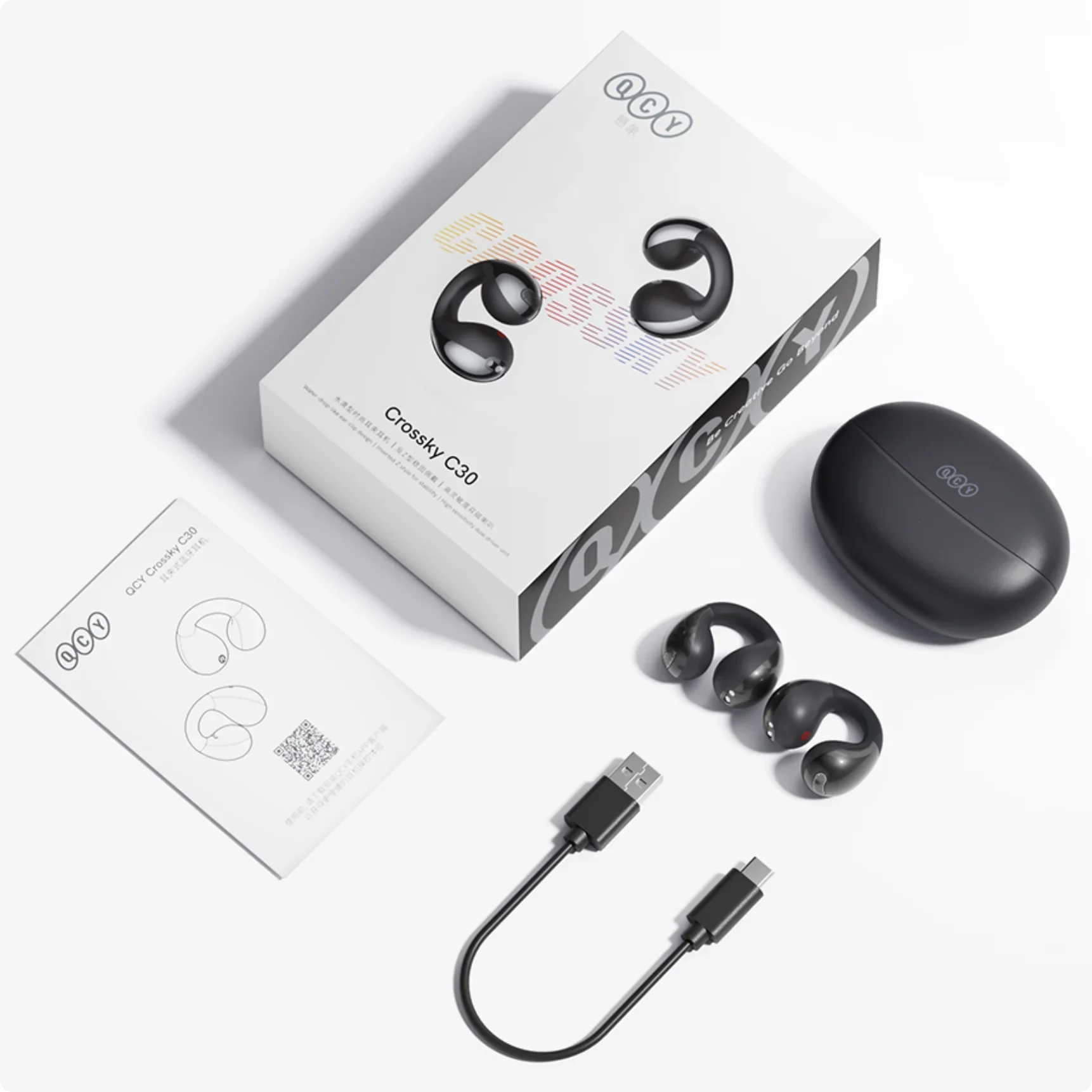 Auriculares de conducción ósea QCY Crossky C30 con estuche de carga, cable USB y manual – negro, diseño abierto para deporte y uso diario