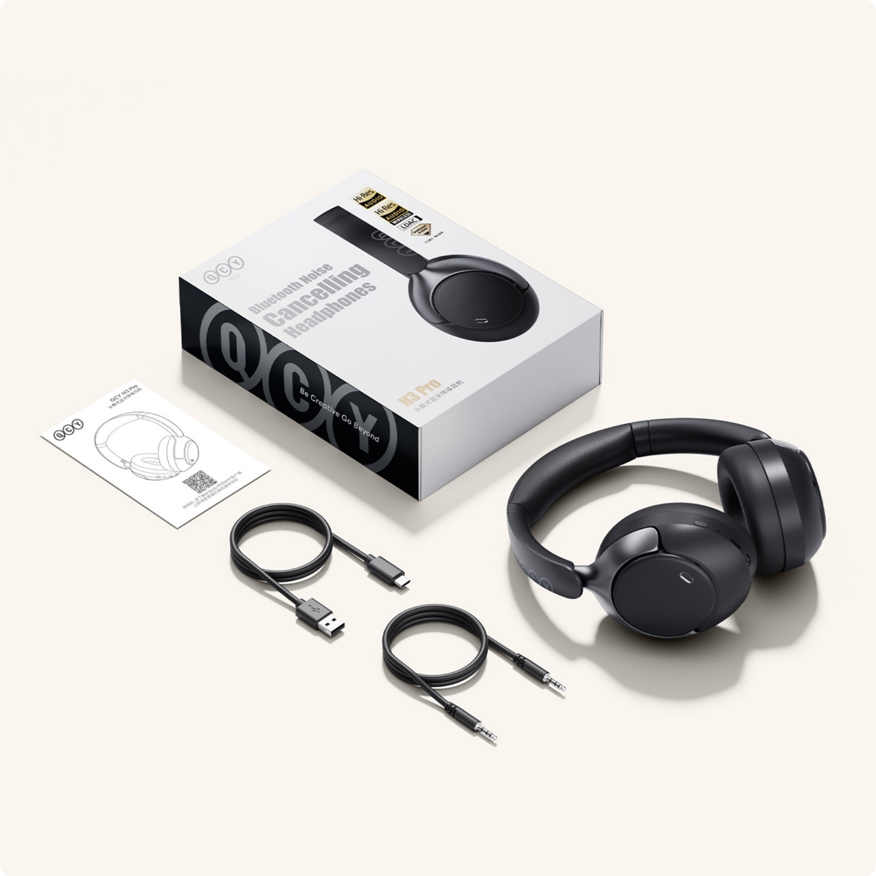 Auriculares Bluetooth QCY H3 Pro con cancelación de ruido, cables y embalaje.