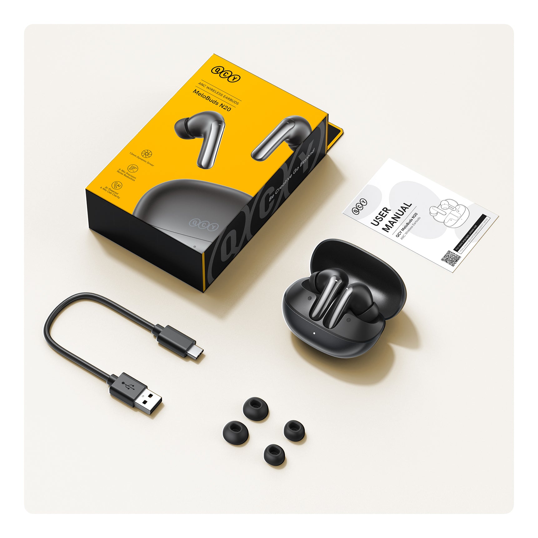 Auriculares Bluetooth QCY MeloBuds N20 ANC con estuche de carga, cable USB-C y tapones de repuesto.